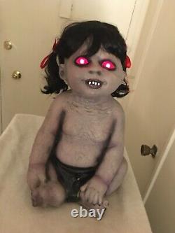 Halloween prop FEMALE ZOMBIE BABY Lights and sounds. Retired. SOLID COND