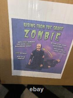 Halloween prop RISING FROM THE GRAVE ZOMBIE. Appears to be BRAND NEW