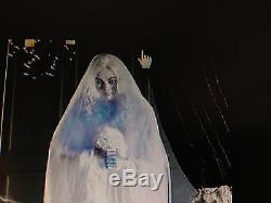New ANIMATED HAUNTED Cemetery GHOST BRIDE Talking PROP Glows Sways Grandinroad