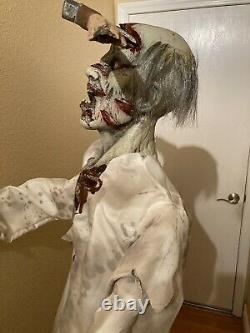 Spirit Halloween Axe'd Zombie Life Size 6 ft. Figure Prop Same Day Ship Retired