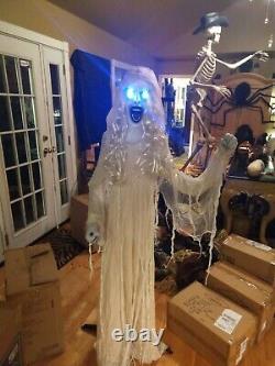 Spirit Halloween Life Size Props White Witch and Black Vampire Light Up Eyes