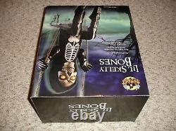 Spirit Halloween Swinging LIL SKELLY BONES Motion Sound Step Pad Activated (NEW)