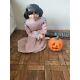 Spirit Halloween Girl Carver Animated Life-size Halloween Prop Lawn Decor