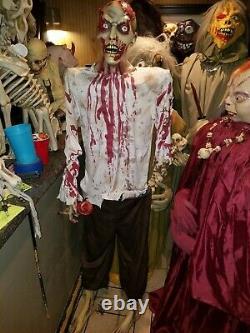 Spirit lifesize bloody zombie man hand halloween prop berzerker